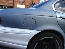 Day 3 - Rear offside quarter and roof line painting time.  This shows the rubbed and wiped down surface.