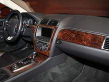 I like the wood. Aluminum  dash inserts makes it look cheap.