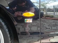 Close up side shot with "R" badge