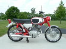 1968 cb160.  Not the actual picture of my first motorcycle, but the same color scheme.  Not real fast, but great on gas mileage.