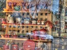 La Grange antique store window and car reflection
