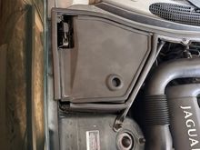 This is the compartment on the right side of the engine compartment.