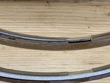 hard to tell but the new one (bottom) is longer