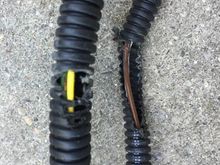 The copper of 2 of the wires became exposed. Presume it was against something too hot (was not near moving parts).