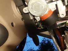 Underneath looking up. See silver screwdriver pointing up to 3rd screw location.  With flashlight and lay on floor look up you will see it. Use this for orientation.