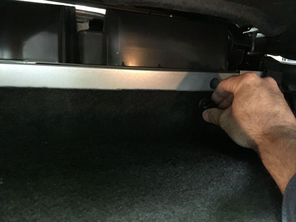 1. First remove the plastic nuts holding the battery cover. Start at the top right...