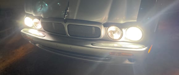 I know this isn’t a good sense of comparison but, they are a bright white bulb. I have them as a low and high beam. In this photo is pictured only the low beams and the inner little peanut bulb is a bright white. I can tell you that they’re plenty bright enough but I don’t get flashed from other drivers as if my high beams are on so it’s not too overwhelming. 