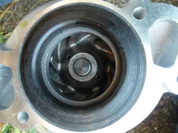 The new one that has a fiber part protruding that had an O-Ring that sealed like the original. Nice metal gasket with a rubberized ring around the two outer passages.