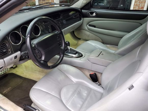 Carbon fiber dash. The leather seats have some cracking. 