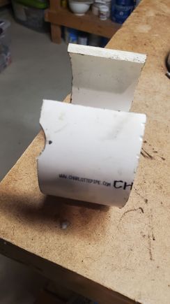 PVC sleeve for press backstop. Made from 4in pipe. Note the notch to accommodate bump on the subframe.