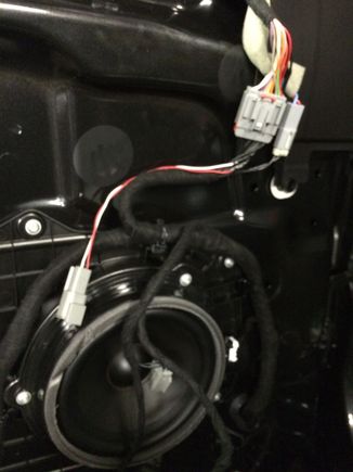 I have wired a positive wire to the door wiring that is pin #13 and a negative wire to pin #12. This is to feed the Cree LED projector you have chosen to light your way.