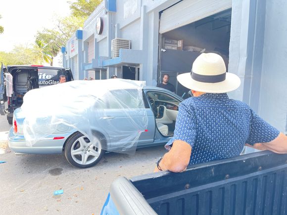My dad looking at his new ride. 