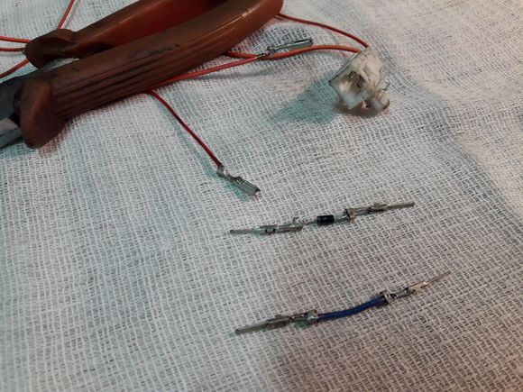 Next, a wire extender and jumpers are made. One jumper with a diode.