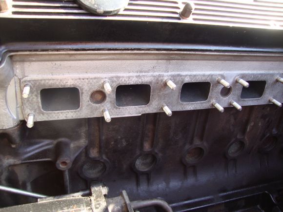 Cleaned, new studs inserted with anti sieze paste awaiting the coated manifolds and heat shield.