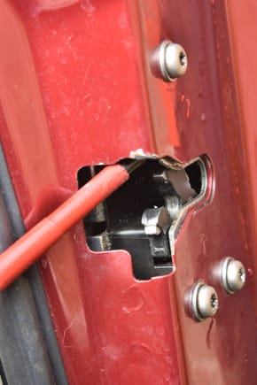 This lock is in the open position..release just at end of screwdriver..