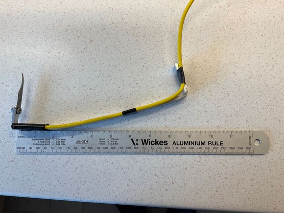 The tool follows AJ’s original design with the addition of the 20 degree bend about 3” back from the blade. (X-Acto blade from eBay)