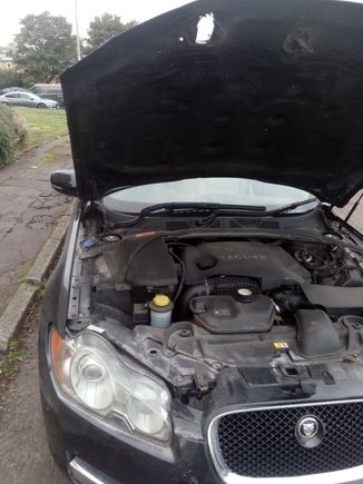 et voila.  I managed to get a replacement bonnet for 90GBP but if you want to repair the damaged bonnet you could.  Remove the old, hacked catch assembly (two screws) then fibreglass a patch to the inside of the top edge.  source and fit a new catch assembly.