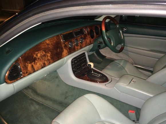 Light Teal main interior with dark teal carpets, facia and steering wheel.