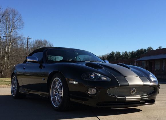 Finally finished! New black walnut metallic paint, wheels, lots of details, mechanically in great shape, and interior totally new, with two tone black and cream with Louis Vuitton inserts and details.