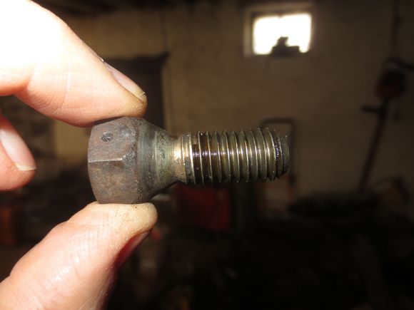 OEM dif to cage fixing bolt. Using a stud allows far deeper threading into the diff casing and more reliable clamping.