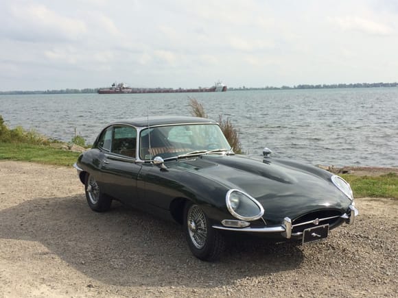 E-Type on Grosse Ile, MI with Freighter in background