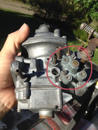 Bypass assembly. Allows air through on over run when the throttle is closed.