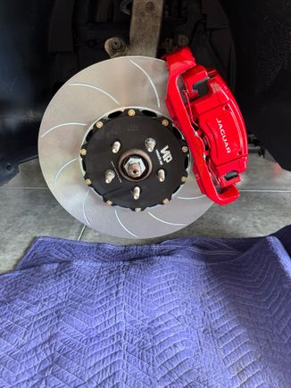 Front caliper back on