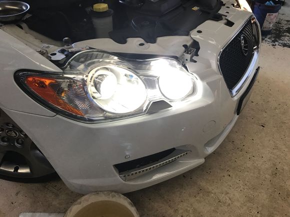 The drivers side of a RHD vehicle with the new LED in the high beam. Colour matches well.