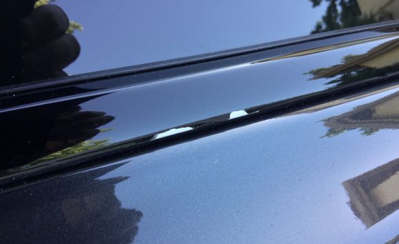 Flaking on passenger rear sidelight trim