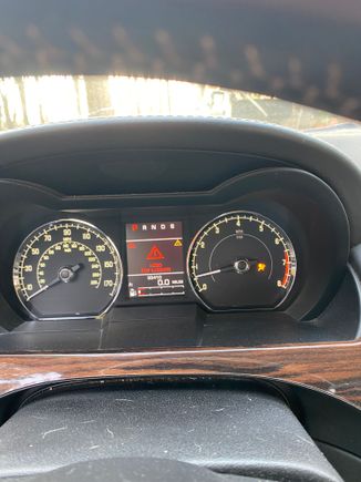 The hood is closed, the roof is not! Gotta love the Queens English! 