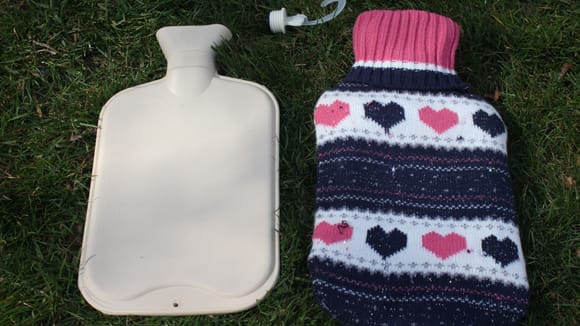 The Smooth Sided Hot Water Bottle was inside this St Valentines Day Knitted Cover