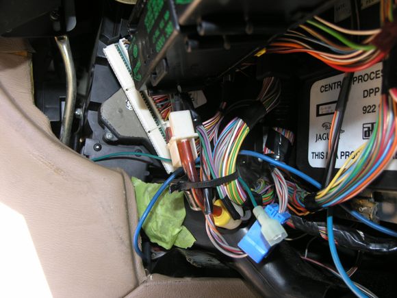 I looked behind the carpet and tryed to see if it was behind the console.