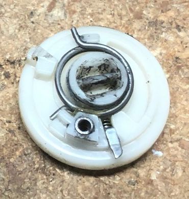 Rotor - big spring side (mates with the mechanical portion of the ignition lock)