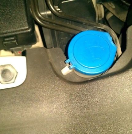 CAUTION: watch for binding at Windshield Washer Filler.