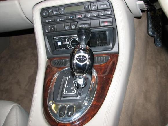 Gear stick knob start button