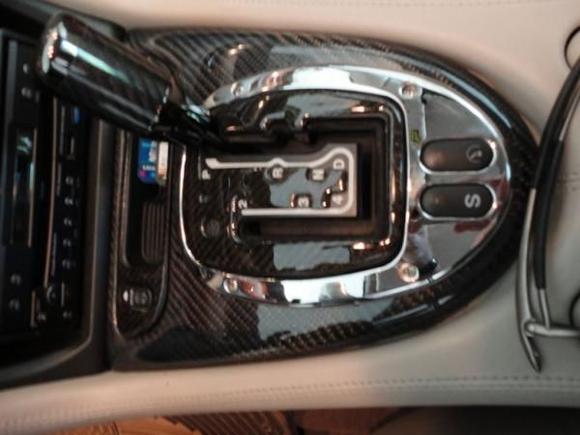 Graphite and polished aluminum gear surround from Mina Galleray,.