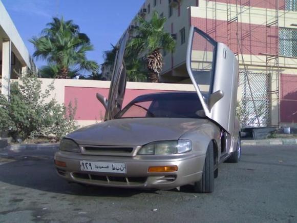 my old toyota camry coupe
lowerd 17" rims and lambo doors