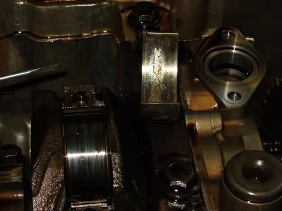 Debris from spun bearing in rear of motor working it's destruction on the other bearings. At least the "rod" is fine.