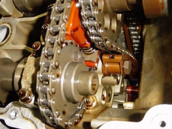 My 2000 XKR engine internal at 62000 miles. Note that the type 2 plastic cam chain tensioner is in excellent condition.