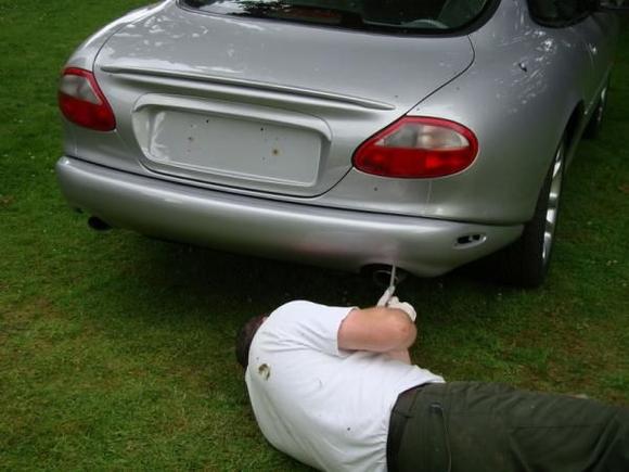 "Now if I can just get that last bolt in. Please note new inner bumper beams from Jaguar are now priced at £520. Needless to say mine came secondhand.