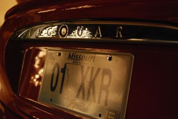 Christmas lights reflecting off back of XKR.
