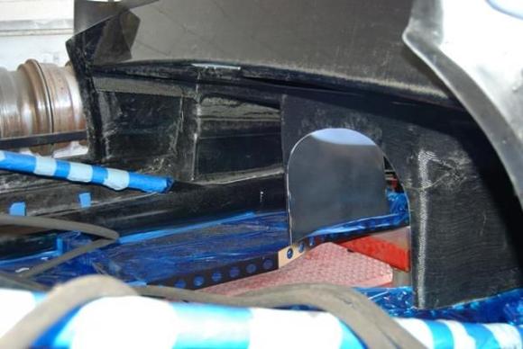 All sections where the carbon fiber body touched the frame were screwed, glued, and wrapped with carbon fiber lay-up to create a uni-body type of construction: