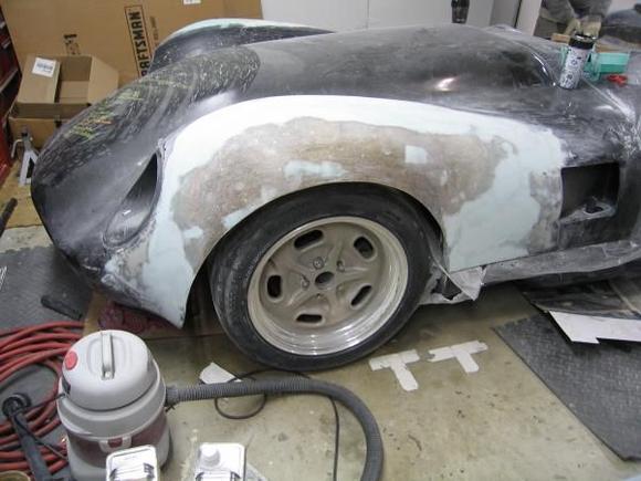 Our goal over the past several weekends was to finish the rough shape of the fenders and then cover the body with one final layer of carbon fiber to give it strength.

First step was to work on and develop the front fender shape and integrate the large flare into the overall shape of the car.  We wanted a wide look without disruption the classic profile of the Lister/Jag style.