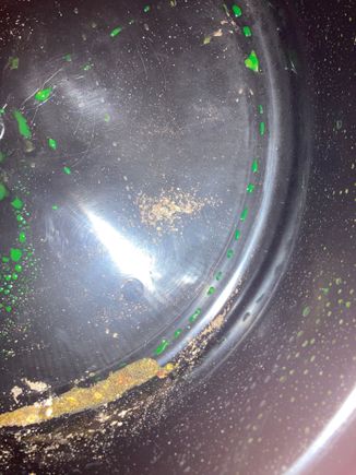 sand like substance when draining coolant, can be picks up with magnet