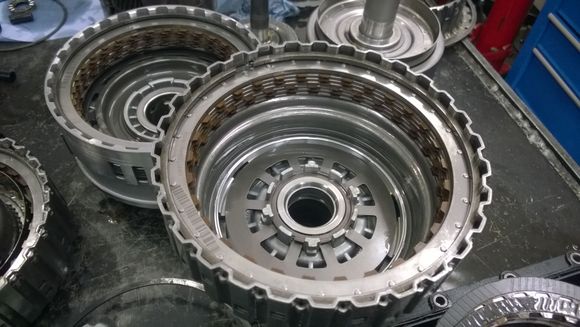 in each clutch pack, there are 1 or 2 more discs, due to them being thinner. The material is also stronger, which also helps