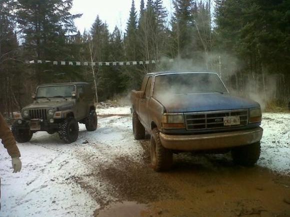 next to the old ford that got stuck, but not the jeep