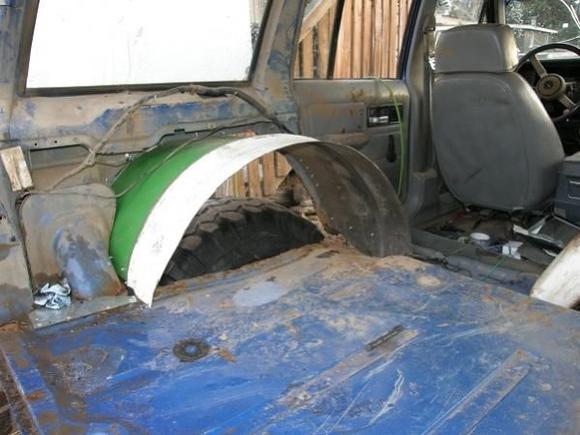 part of a 45 gallon drum chopped into a rear fender