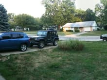 The wife and I(and first child around March 12!) 3 Jeeps, 07 Compass, 08 Wrangler, and 00 Cherokee.
