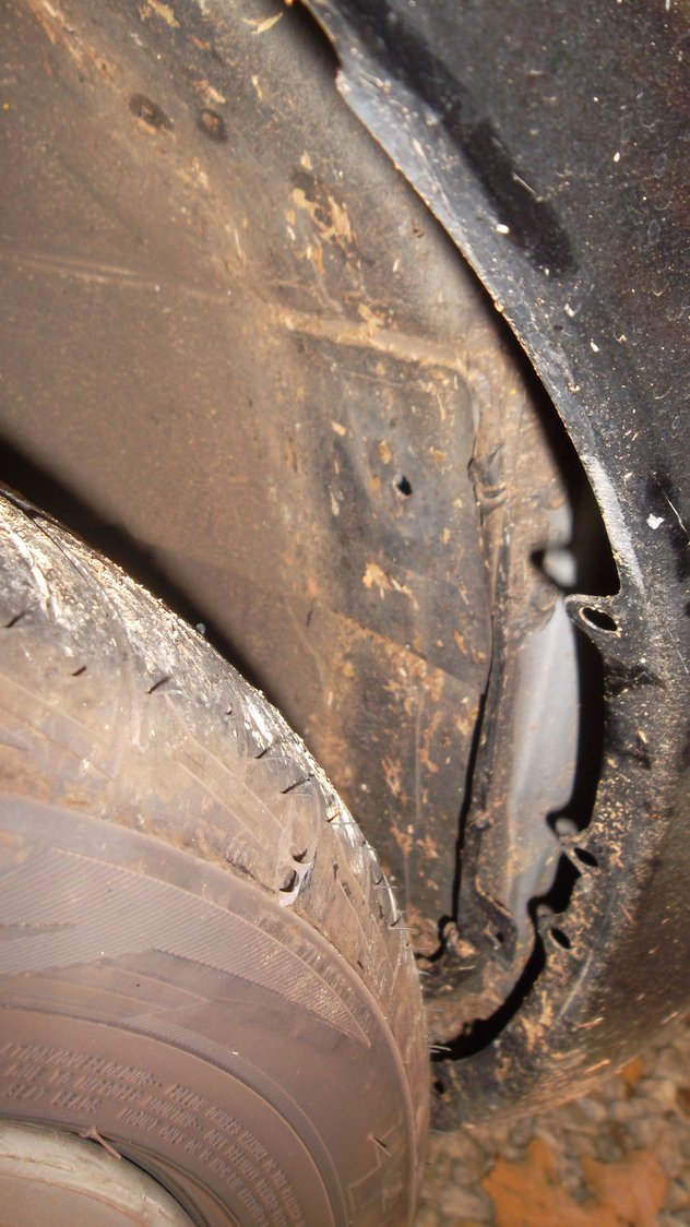 Back of front tire showing empty space.