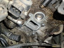 I DID advised her on the oil leaks from the valve cover gasket. New plug installed waiting to be torqued. It was IN THERE TIGHT